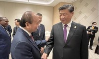 Chủ tịch nước Nguyễn Xuân Phúc gặp Chủ tịch Trung Quốc Tập Cận Bình ngày 18/11 tại Bangkok. (Ảnh: Baoquocte)