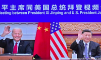 Tổng thống Mỹ Joe Biden (trái) và Chủ tịch Trung Quốc Tập Cận Bình trong cuộc hội đàm trực tuyến vào tháng 11. Ảnh: Xinhua 