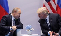 Tổng thống Nga Vladimir Putin (trái) và Tổng thống Mỹ Donald Trump (phải). Ảnh: Reuters