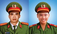 Di ảnh 2 cán bộ chiến sĩ Công an quận Sơn Trà (TP Đà Nẵng) vừa hi sinh khi làm nhiệm vụ. 