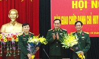 Hội nghị bàn giao chức trách, nhiệm vụ Chỉ huy trưởng Bộ Chỉ huy Quân sự tỉnh Nam Định. Ảnh: VGP