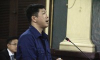 Cựu cán bộ CSGT tỉnh Đồng Nai - bị can Nguyễn Cảnh Chân trong 1 phiên tòa trước đây. Ảnh: Tân Châu