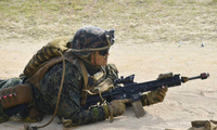 Một lính thuỷ đánh bộ Mỹ tham gia đợt tập trận chung với lực lượng Nhật Bản trên đảo Okinawa. (Ảnh: Kyodo)