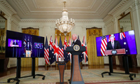 Tổng thống Mỹ Joe Biden cùng Thủ tướng Anh Boris Johnson và Thủ tướng Úc Scott Morrison trong lễ công bố trực tuyến thành lập liên minh an ninh AUKUS ngày 15/9. (Ảnh: Reuters)