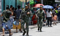 Binh lính Philippines được huy động xuống phố trong ngày tổng tuyển cử. ̣(Ảnh: Reuters)