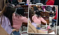 Hình ảnh bà mẹ cho con gái đi vệ sinh giữa nhà hàng bị đưa lên mạng và chỉ trích gay gắt. (Ảnh: Weibo)