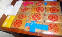 25 bánh heroin phát hiện trôi dạt ở bờ biển Quảng Nam được người dân giao nộp cơ quan chức năng.