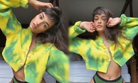 Cách ly ở nhà, Gizele Oliveira &apos;thả rông&apos; ngực với mốt áo cài kim băng