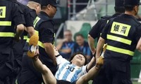 Bị cảnh sát bắt vì ‘tấn công’ Messi, fan Trung Quốc vẫn cười tươi