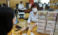 Lãi suất đã giảm có lợi phần nào cho doanh nghiệp vượt khó Ảnh: Như Ý