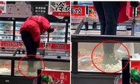 Nhân viên siêu thị Trung Quốc trèo vào tủ đông, giẫm giày lên thực phẩm gây phẫn nộ