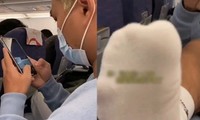 Bị người ngồi cạnh nhắc vì chân hôi, hành khách trên máy bay dí chân vào mũi người nhắc