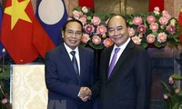 Chủ tịch nước: Tăng cường kết nối hai nền kinh tế Việt Nam-Lào 