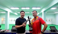 Xạ thủ Jin Jong Oh và Hoàng Xuân Vinh.