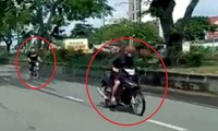 Nhóm thanh thiếu niên chặn đường Nguyễn Văn Linh để đua xe vào chiều 18/4.