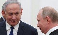 Tổng thống Nga Putin (phải) và Thủ tướng Israel Netanyahu (trái). Ảnh: Reuters