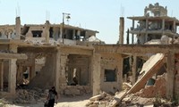 Thành phố Deraa, Syria, không xung đột vào ngày 9/7 sau lệnh ngừng bắn. Ảnh: Reuters