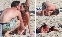 Liam Hemsworth hôn đắm đuối bạn gái người mẫu trên bãi biển