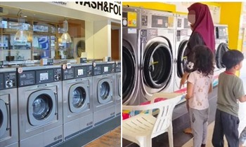 Mẹ mải nghe điện thoại, con trai đùa nghịch đẩy luôn em gái vào máy giặt