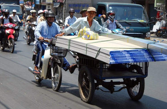 TPHCM đề xuất lộ trình ‘xóa sổ’ xe 3 - 4 bánh thô sơ ảnh 1