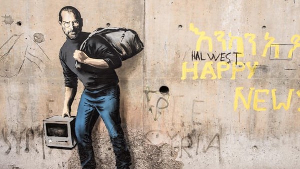 Banksy - Nghệ sĩ graffiti lừng danh thế giới và câu chuyện về bức họa tự hủy gây xôn xao ảnh 2