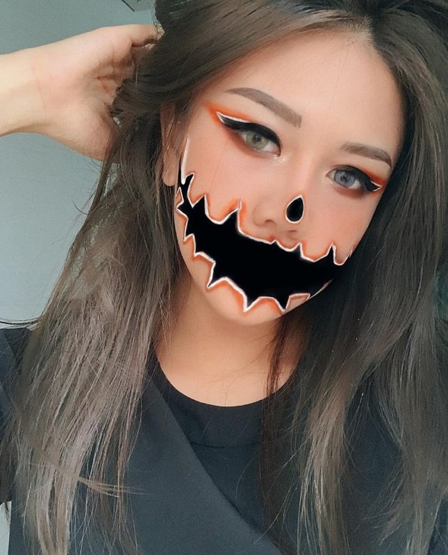 Halloween chẳng biết làm sao cho "độc lạ"? Học ngay những mẫu hóa trang sau đây! ảnh 1