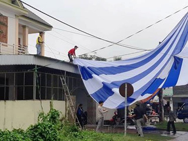 Dựng rạp, mổ lợn xem chung kết AFF cup tại nhà Văn Đức, Quang Hải ảnh 2