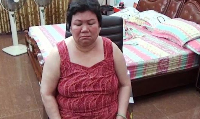 Bà Nguyễn Thị Điệp bị công an bắt quả tang. 