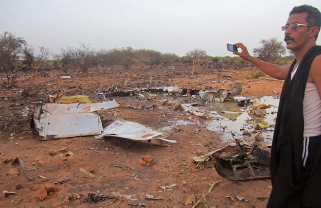Hiện trường bi thảm của vụ rơi máy bay AH5017 của Algeria (Nguồn: AFP) 