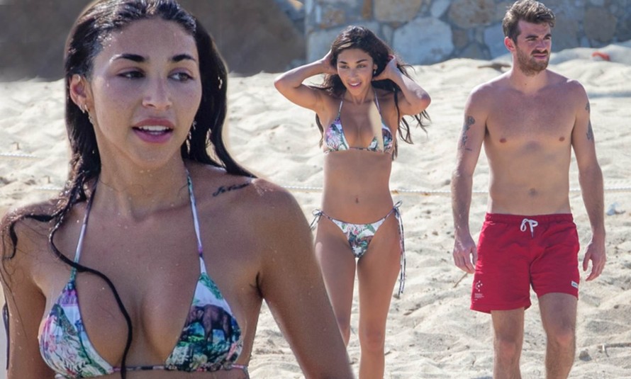 Nữ DJ 'bốc lửa' khoe dáng với bikini nhỏ xíu bên bạn trai ở biển