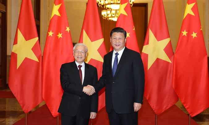Tổng Bí thư Nguyễn Phú Trọng và Tổng Bí thư, Chủ tịch Trung Quốc Tập Cận Bình tại Đại lễ đường Nhân dân Trung Quốc. Ảnh: TTXVN.