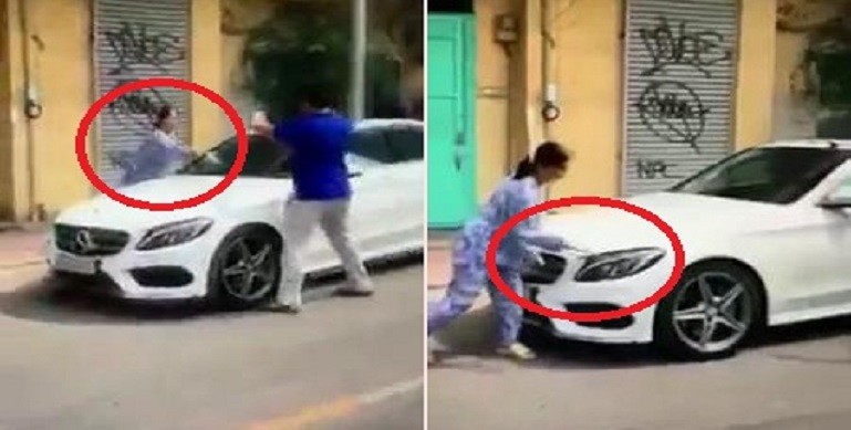 Bị thách thức,người phụ nữ cầm dao, búa đập phá xe đỗ trước cửa nhà