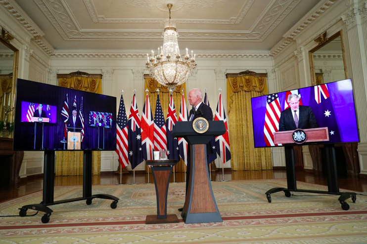 Tổng thống Mỹ Joe Biden cùng Thủ tướng Anh Boris Johnson và Thủ tướng Úc Scott Morrison trong lễ công bố trực tuyến thành lập liên minh an ninh AUKUS ngày 15/9. (Ảnh: Reuters)
