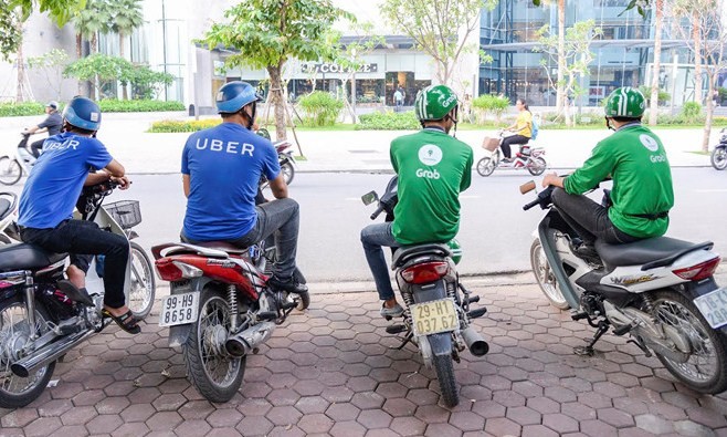 Cũng như Grab, Uber hoạt động cả lĩnh vực vận tải hành khách như taxi và xe ôm tại Việt Nam, và cũng vấp phải sự phản ứng quyết liệt với các hãng xe truyền thống và cả với các đối tác tài xế. Ảnh: Quỳnh Trang/Zing