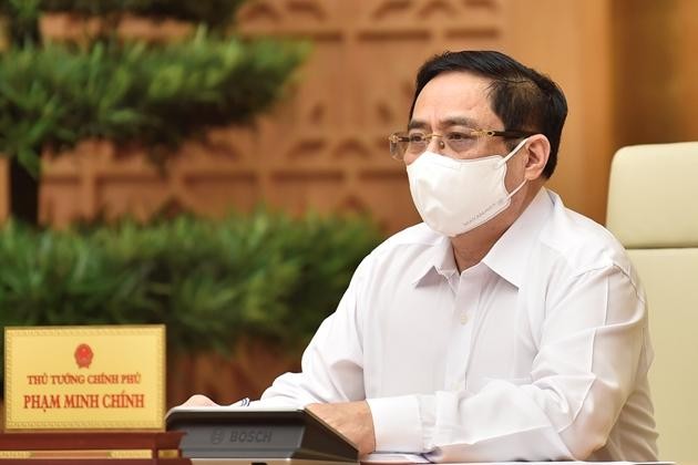 Thủ tướng Chính phủ Phạm Minh Chính triệu tập cuộc họp trực tuyến với tỉnh Bắc Giang, Bắc Ninh và các lực lượng chống dịch tại địa phương này - Ảnh: VGP/Nhật Bắc. Ảnh Chinhphu.vn