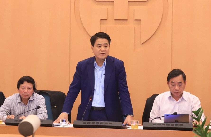 Chủ tịch UBND TP Hà Nội Nguyễn Đức Chung tại một buổi họp báo chống dịch COVID-19