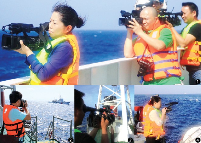 Các nhà báo trong nước và quốc tế tác nghiệp tại thực địa Hoàng Sa (ảnh 1). PV Tiền Phong Nguyễn Huy tác nghiệp tại khu vực giàn khoan 981 (ảnh 2). PV tác nghiệp trên tàu CSB8003 (ảnh 3). Nữ nhà báo Akiko của truyền hình NHK, Nhật Bản tác nghiệp (ảnh 4). 