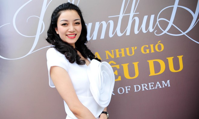 Phạm Thu Hà diện váy trắng muốt ra mắt album mới