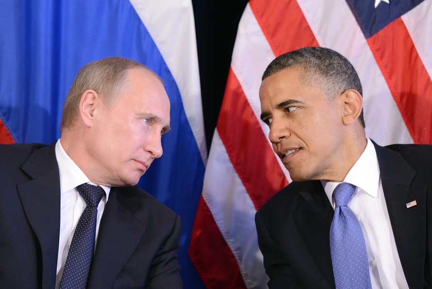Ông Putin (trái) đã có cuộc gặp đầu tiên với ông Obama sau nhiều tháng "đóng băng quan hệ" do cuộc khủng hoảng Ukraine