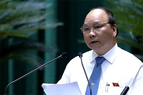 Phó Thủ tướng Nguyễn Xuân Phúc tại phiên chất vấn chiều 12/6. Ảnh chụp qua màn hình.
