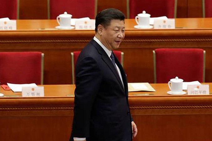 Tổng bí thư, Chủ tịch Trung Quốc Tập Cận Bình bước vào hội trường nơi tổ chức kỳ họp quốc hội đang tổ chức ở Bắc Kinh. Ảnh: Jason Lee.