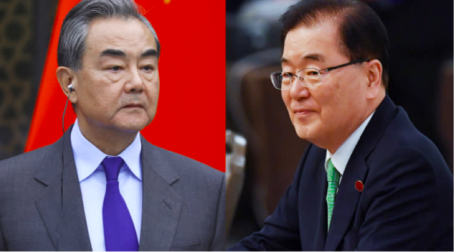 Ngoại trưởng Trung Quốc Vương Nghị và người đồng cấp Hàn Quốc Chung Eui-yong. Ảnh: Yonhap 