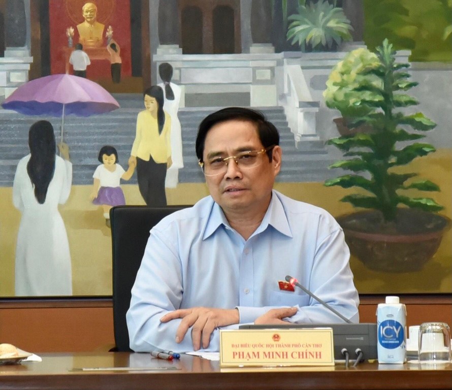 Thủ tướng Phạm Minh Chính tại phiên thảo luận tổ chiều 24/7. Ảnh Như Ý