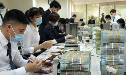 Nhiều nhà băng tuyên bố tuyển thêm hàng nghìn người sau một vài năm mạnh tay cắt giảm. Ảnh: VnExpress