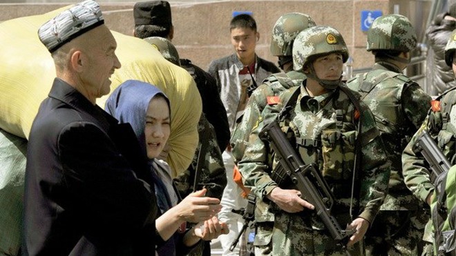Trung Quốc siết chặt an ninh sau các vụ khủng bố ở Tân Cương (Nguồn: Kyodo/TTXVN)