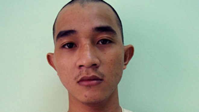 Nghi can Nguyễn Tấn Thạnh lúc bị bắt - Ảnh: Đỗ Trường