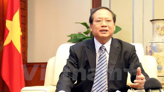 Bộ trưởng Trương Minh Tuấn đề nghị doanh nghiệp cần mạnh dạn phản ánh, tố cáo với Thanh tra Bộ Thông tin và Truyền thông những sai phạm của báo chí. (Ảnh: Vietnam+)