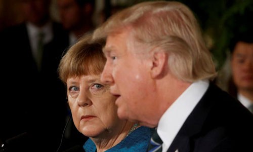 Thủ tướng Đức Angela Merkel (trái) và Tổng thống Mỹ Donald Trump. Ảnh: Reuters.