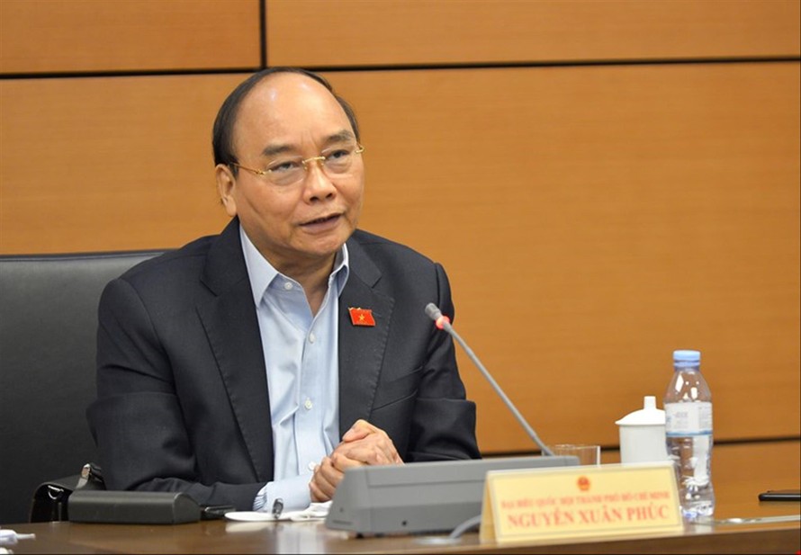 Chủ tịch nước Nguyễn Xuân Phúc tại phiên thảo luận ở Quốc hội
