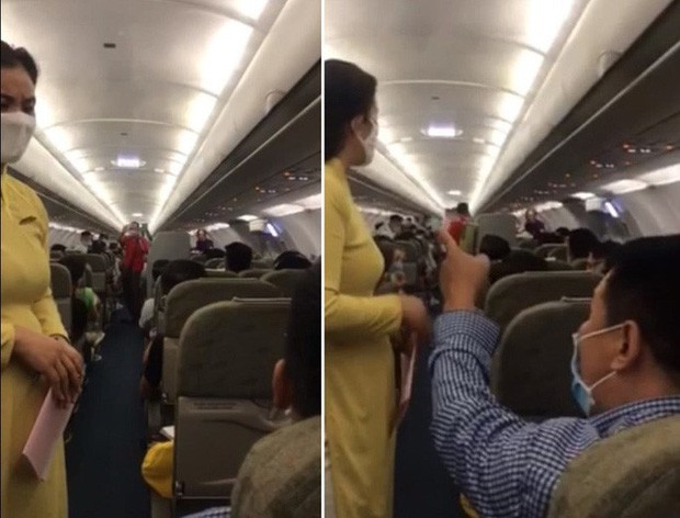 Nam hành khách gây rối, nhục mạ tiếp viên và hành khách xung quanh chỉ vì chỗ để hành lý xách tay bị cấm bay 1 năm. Ảnh chụp từ clip.